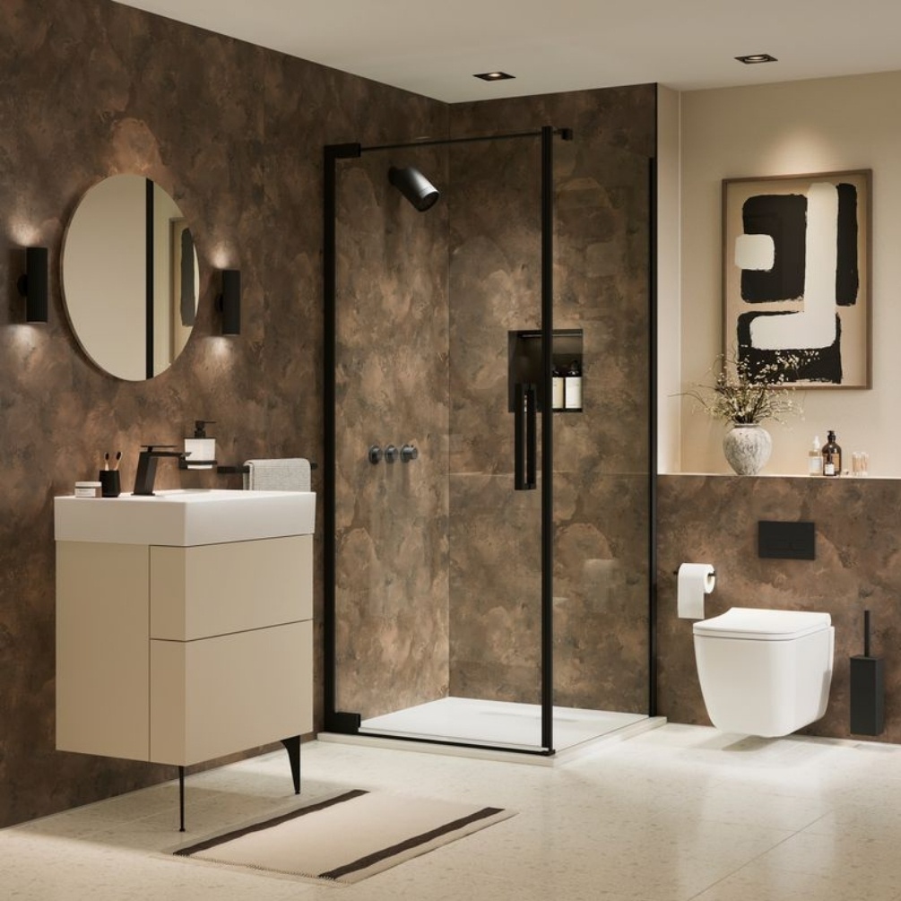 Lifestyle image of the Showerwall Laminate Bronze Smoke 2440mm x 1200mm Square Cut Hydrocore Wall Panel - SW89 in bathroom with corner walk-in shower, wall hung vanity with basin, and wall-hung toilet